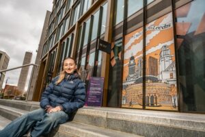 Holly Prosser, artist in front of her art installation at Wellington Place